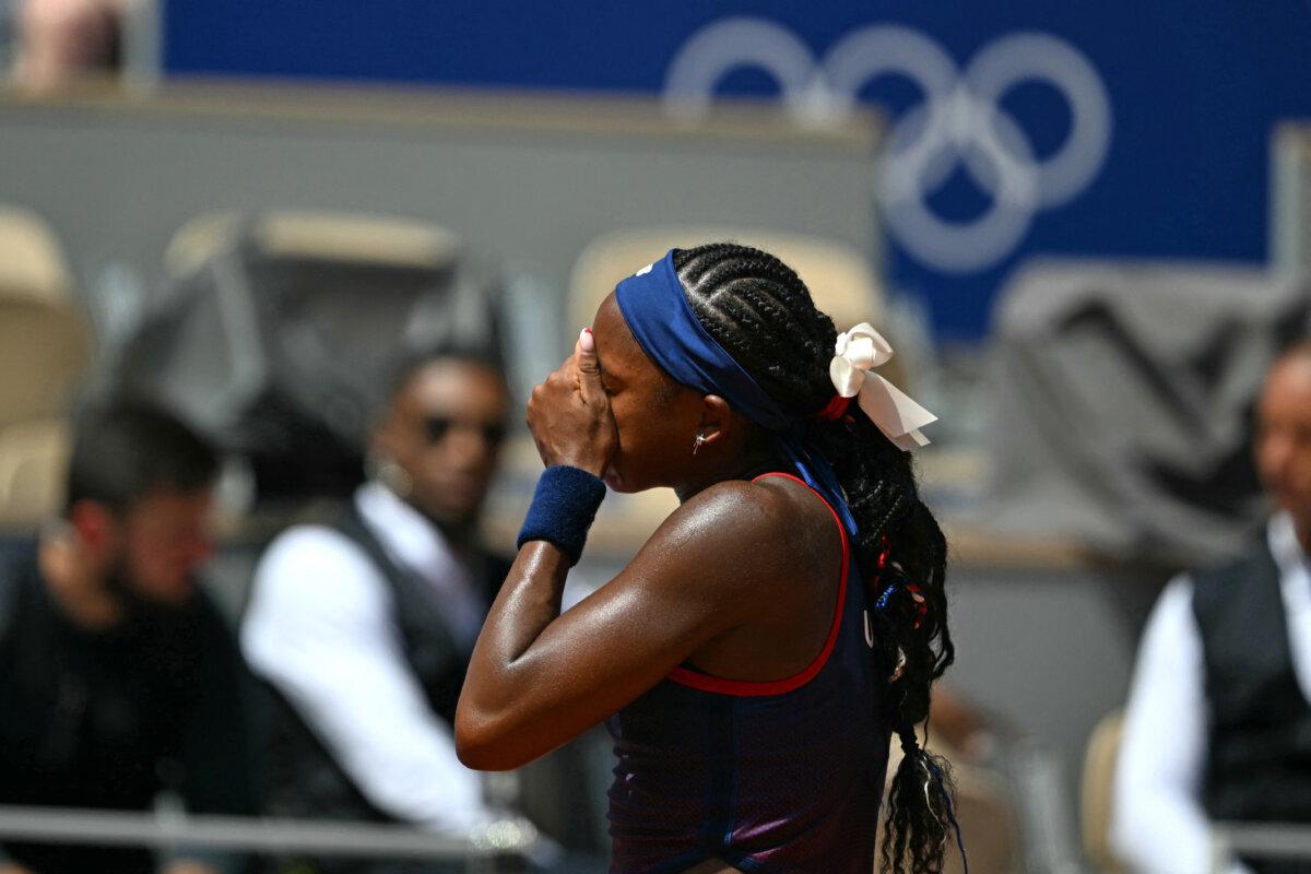 Team USA's Coco Gauff reacts after a call goes against her while playing Croatia's Donna Vekic during their women's singles third round tennis match on Court Philippe-Chatrier at the Roland-Garros Stadium during the Paris 2024 Olympic Games, in Paris on July 30, 2024. (Patricia De Melo Moreira/ AFP via Getty Images)