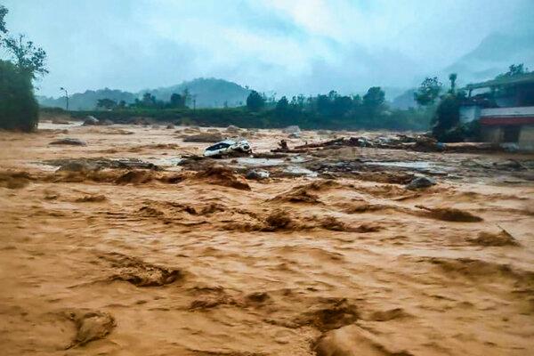 Damaged car at the landslide site in Wayanad, India, on July 30, 2024. (National Disaster Response Force (NDRF)/AFP via Getty Images)