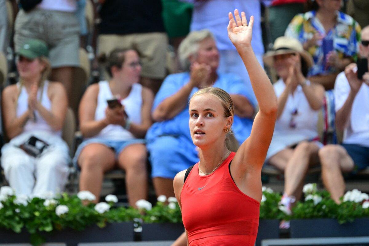 Slovakia's Anna Karolina Schmiedlova reacts after beating Italy's Jasmine Paolini in their women's singles third round tennis match on Court Suzanne-Lenglen at the Roland-Garros Stadium during the Paris 2024 Olympic Games, in Paris on July 30, 2024. (Martin Bernetti/AFP via Getty Images)