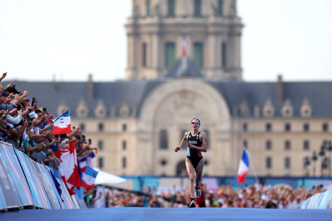 France’s Beaugrand and Britain’s Yee Win Olympic Triathlon After Concerns About Seine Water Quality