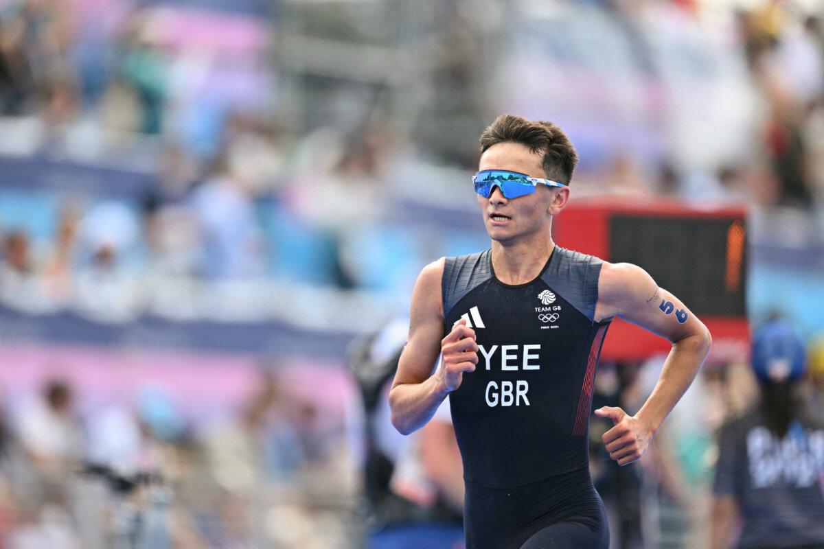 Britain's Alex Yee competes in the running stage during the men's individual triathlon at the Paris 2024 Olympic Games in central Paris on July 31, 2024. (Andrej Iaakovic/ AFP via Getty Images)