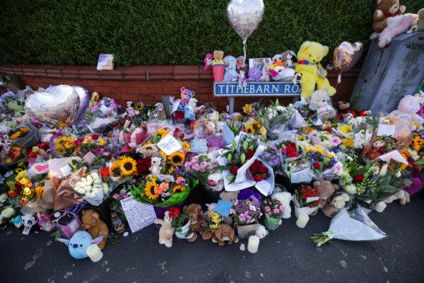 Floral tributes on the junction of Tithebarn Road and Hart Street in Southport, near the scene where three children were fatally stabbed on July 31, 2024. (James Speakman/PA Wire)
