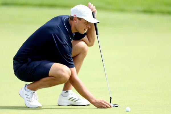 Ludvig Aberg of Team Sweden lines up a putt on the 13th green during a practice round on day five of the Olympic Games Paris 2024 at Le Golf National in Paris, France, on July 31, 2024. (Kevin C. Cox/Getty Images)