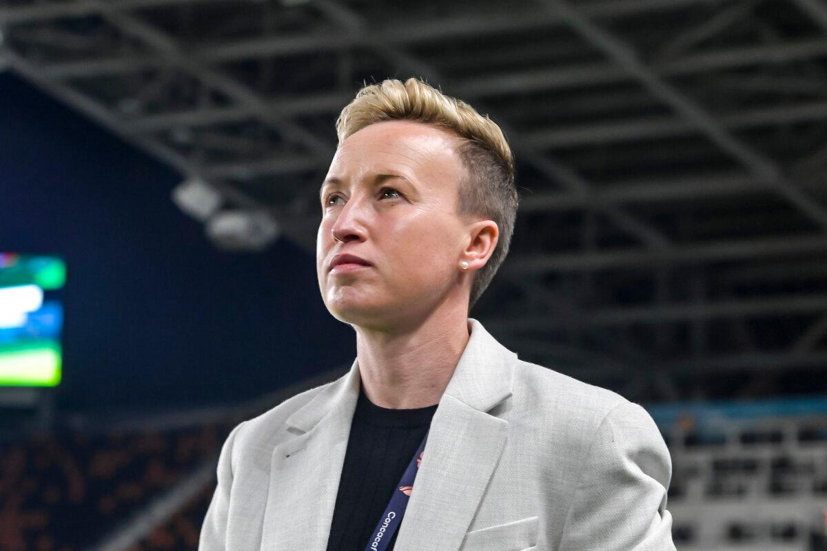 Canada women's national team head coach Beverly Priestman walks onto the pitch prior to their game against El Salvador during the 2024 Concacaf W Gold Cup at Shell Energy Stadium in Houston, Texas, on February 22, 2024. (Logan Riely/Getty Images)