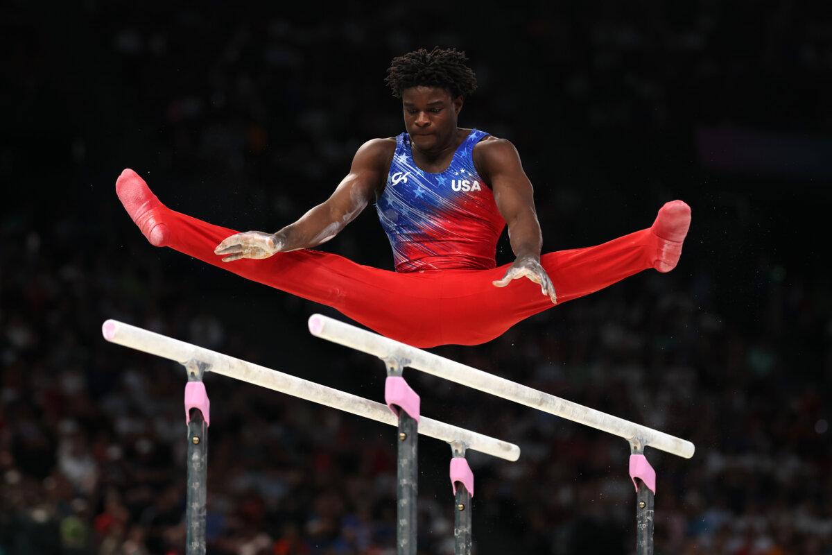 Frederick Richard of Team United States competes on the parallel bars during the Artistic Gymnastics Men's All-Around Final on day five of the Olympic Games Paris 2024 at Bercy Arena in Paris, on July 31, 2024. (Jamie Squire/Getty Images)