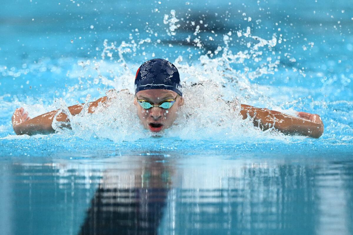 France's Leon Marchand competes in the final of the men's 200m butterfly swimming event during the Paris 2024 Olympic Games at the Paris La Defense Arena in Nanterre, west of Paris, on July 31, 2024. (Jonathan Nackstrand/AFP via Getty Images)