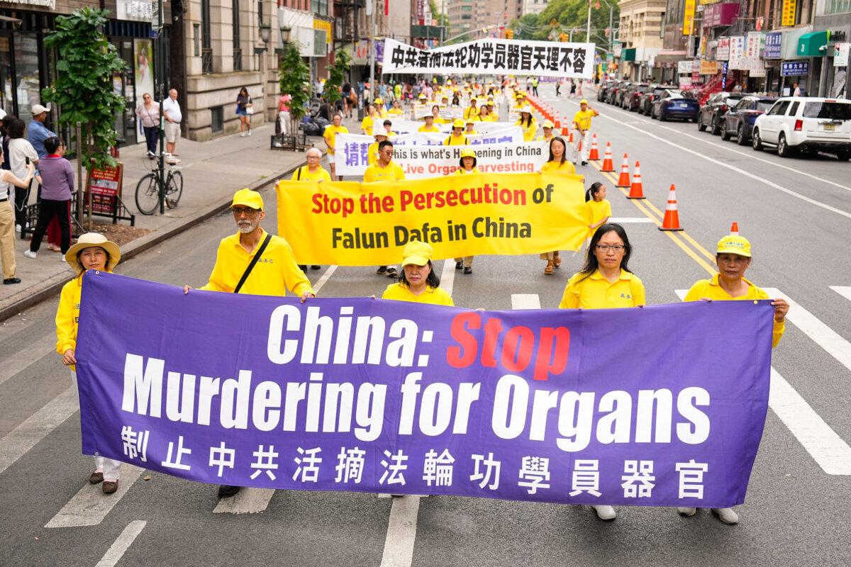 Falun Gong practitioners march during a parade calling for the end of the Chinese Communist Party's 25 years of ongoing persecution against the spiritual practice, in New York City on July 20, 2024. (Larry Dye/The Epoch Times)