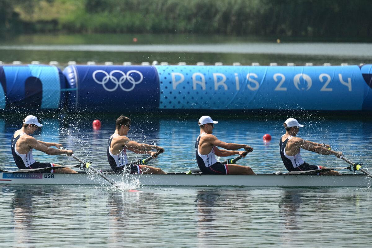 (L-R) US' Nick Mead, Justin Best, Michael Grady, and Liam Corrigan compete for the gold medal in the men's four final rowing competition at Vaires-sur-Marne Nautical Centre in Vaires-sur-Marne during the Paris 2024 Olympic Games on August 1, 2024. (Bertrand GUAY / AFP via Getty Images)