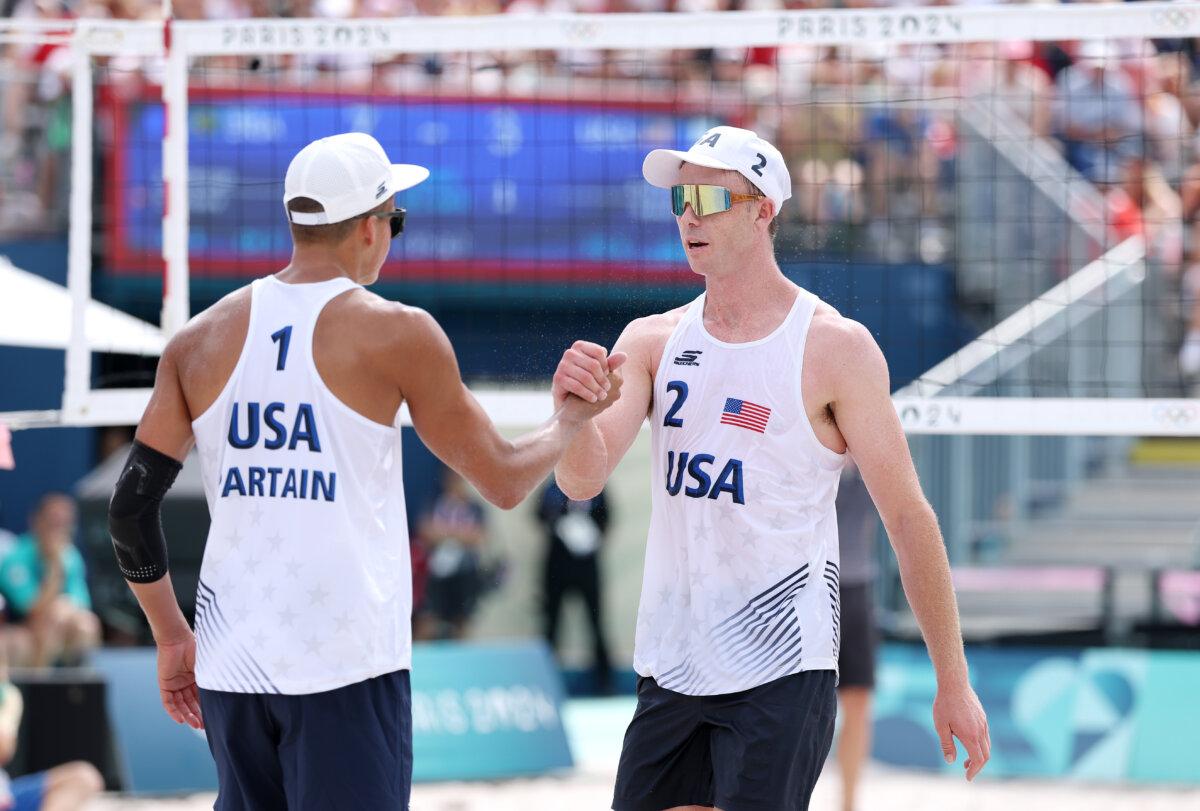 Andy Benesh of Team United States celebrates with teammate Miles Partain during the Men's Preliminary Phase - Pool A match between Team United States and Team Brazil on day six of the Olympic Games Paris 2024 in Paris, on August 1, 2024. (Lintao Zhang/Getty Images)