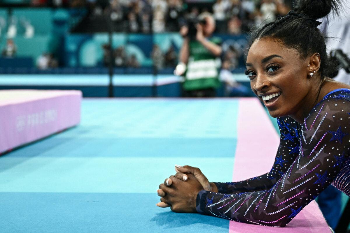 US' Simone Biles cwaits for the results at the end of the artistic gymnastics women's all around final of the Paris 2024 Olympic Games at the Bercy Arena in Paris, on August 1, 2024. (Loic Venance/AFP via Getty Images)