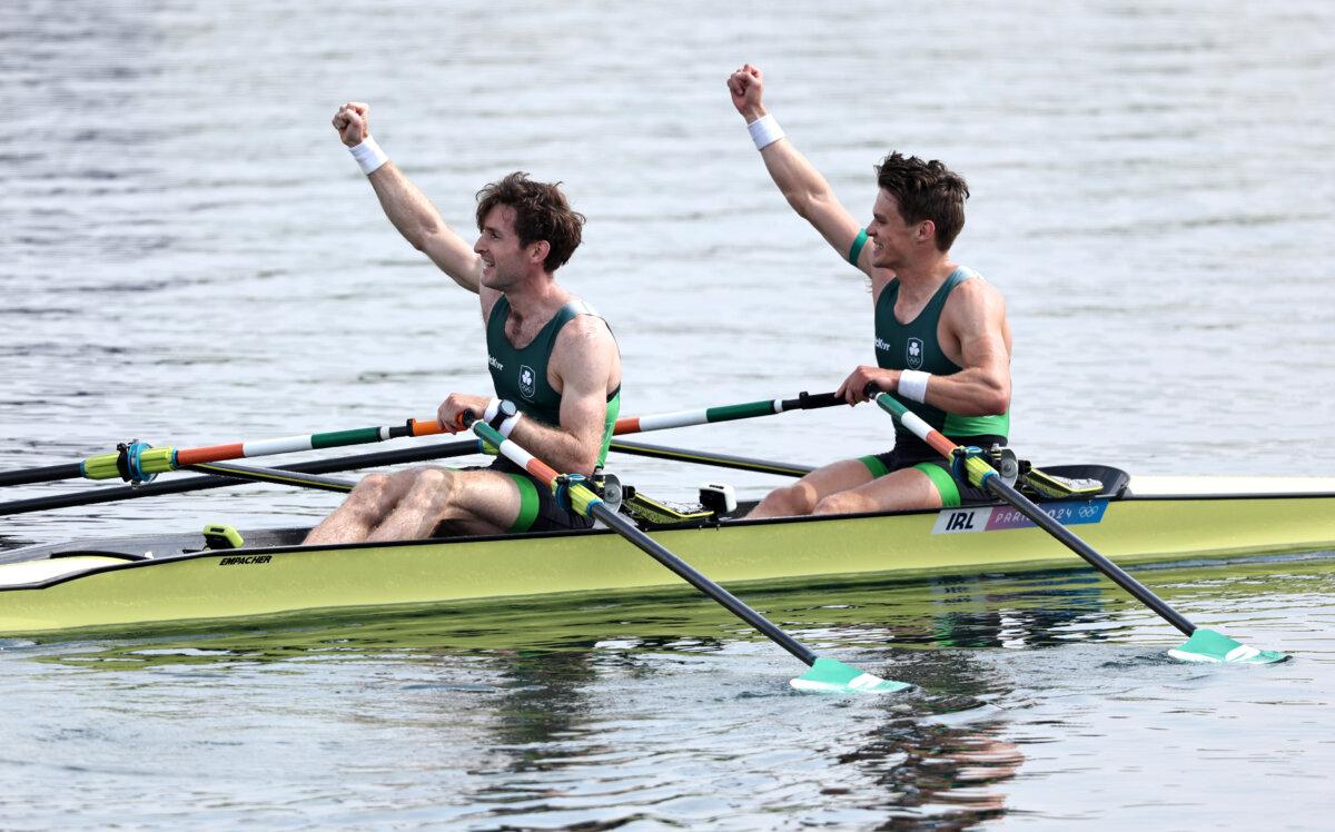 Fintan McCarthy and Paul O'Donovan of Team Ireland celebrate winning the gold medals after competing in the Rowing Lightweight Men's Double Sculls Final A on day seven of the Olympic Games Paris 2024 at Vaires-Sur-Marne Nautical Stadium in Paris on August 2, 2024. (Francois Nel/Getty Images)