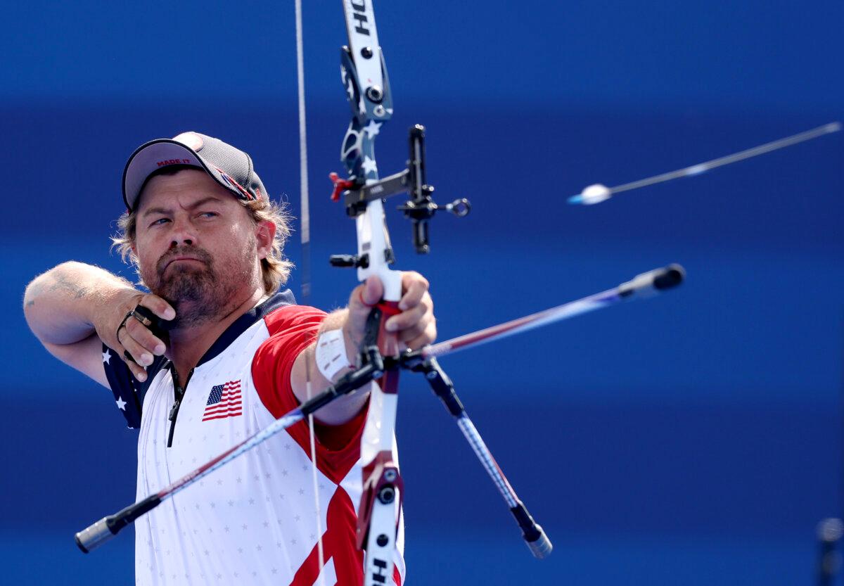 Brady Ellison of Team United States competes during the Archery Mixed Team Bronze medal match contest against Team India on day seven of the Olympic Games Paris 2024 at Esplanade Des Invalides in Paris on August 2, 2024. (Alex Pantling/Getty Images)