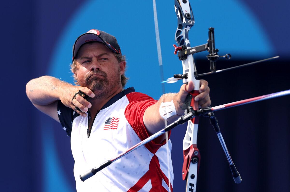 Brady Ellison of Team United States competes during the Mixed Team 1/8 Elimination Round match between Team United States and Team Uzbekistan on day seven of the Olympic Games Paris 2024 at Esplanade Des Invalides in Paris on August 2, 2024. (Alex Pantling/Getty Images)
