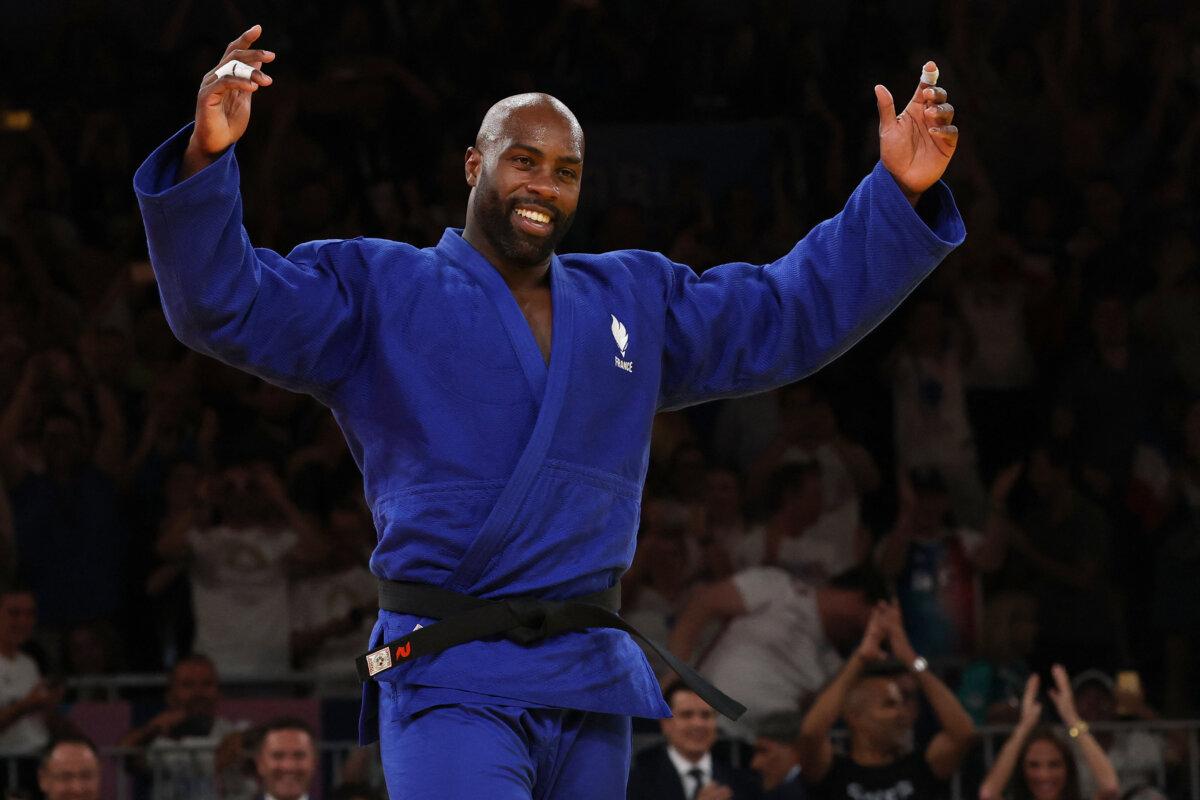 France's Teddy Riner reacts after beating South Korea's Kim Min-jong in the judo men's +100kg gold bout of the Paris 2024 Olympic Games at the Champ-de-Mars Arena, in Paris on August 2, 2024. (Jack Guez/AFP via Getty Images)