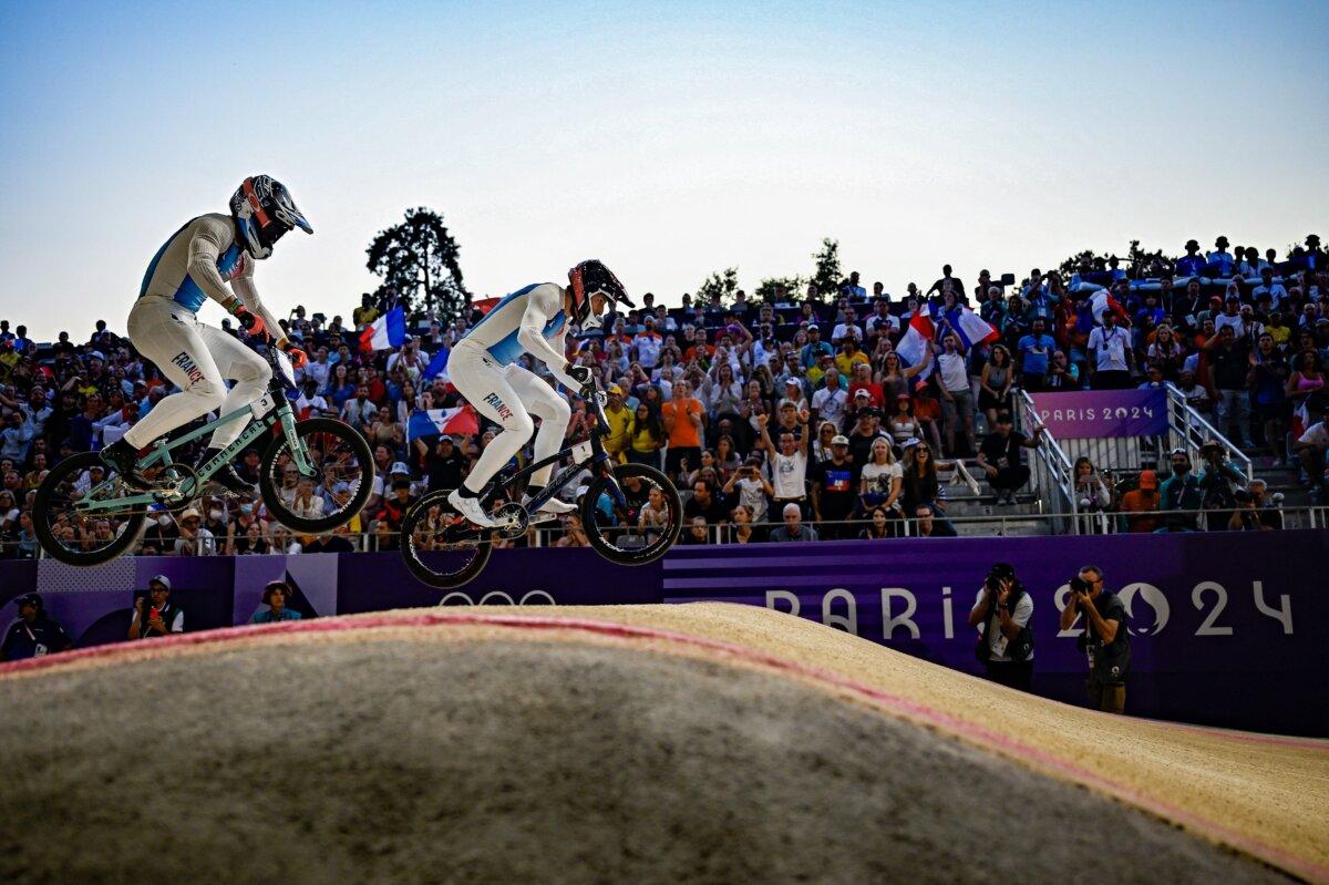 France's #01 Joris Daudet and France's #03 Sylvain Andre compete in the third run of the Men's Cycling BMX Racing semifinals during the Paris 2024 Olympic Games in Saint-Quentin-en-Yvelines, on August 2, 2024. (Julien De Rosa/ AFP via Getty Images)