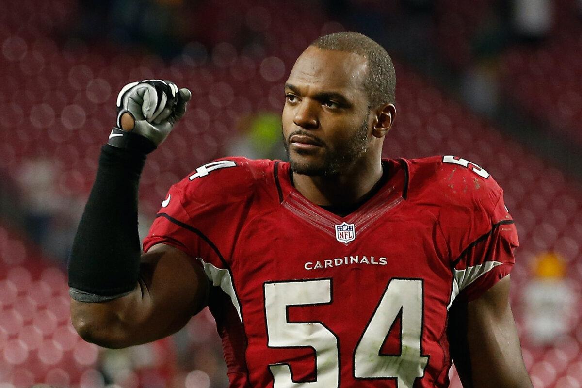 Linebacker Dwight Freeney (54) of the Arizona Cardinals walks off the field following the NFL game against the Green Bay Packers at the University of Phoenix Stadium in Glendale, Ariz., on Dec. 27, 2015. (Christian Petersen/Getty Images)