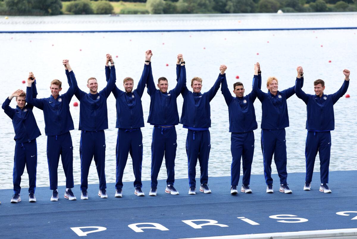 Henry Hollingsworth, Nick Rusher, Christian Tabash, Dean Clark, Chris Carlson, Peter Chatain, Evan Olson, Pieter Quinton and Rielly Milne of Team United States celebrate with their Bronze medals for the Men's Eight Finals on day eight of the Olympic Games Paris 2024 at Vaires-Sur-Marne Nautical Stadium in Paris on August 3, 2024. (Justin Setterfield/Getty Images)