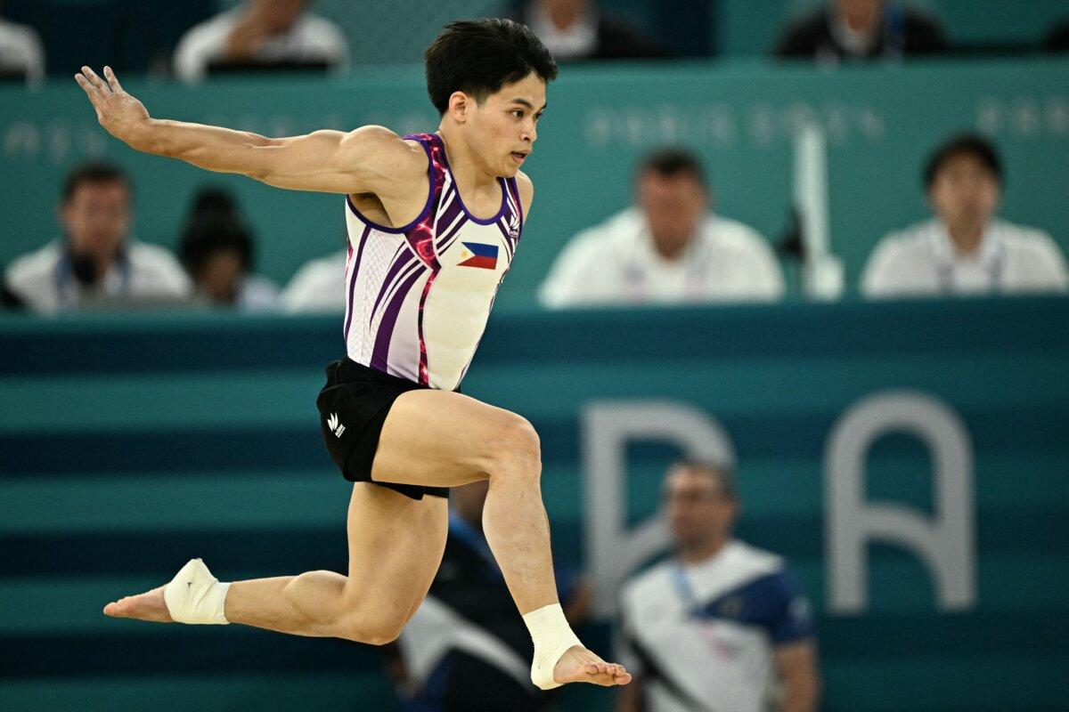 Philippines' Carlos Edriel Yulo competes in the artistic gymnastics men's floor exercise final during the Paris 2024 Olympic Games at the Bercy Arena in Paris, on August 3, 2024. (Lionel Bonaventure/AFP via Getty Images)