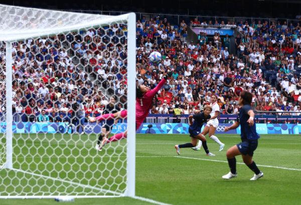 Trinity Rodman (5) of Team United States scores her team's first goal during the Women's Quarterfinal match between United States and Japan during the Olympic Games Paris 2024 at Parc des Princes, in Paris on Aug. 3, 2024. (Marc Atkins/Getty Images)