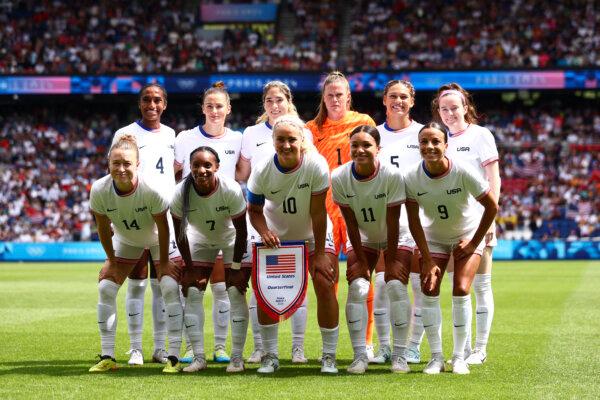 Team United States pose for a team photo prior to the Women's Quarterfinal match between United States and Japan during the Olympic Games Paris 2024 at Parc des Princes in Paris on Aug. 3, 2024. (Marc Atkins/Getty Images)