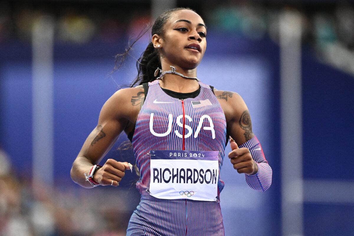 US' Sha'Carri Richardson reacts after competing in the women's 100m semi-final of the athletics event at the Paris 2024 Olympic Games at Stade de France in Saint-Denis, north of Paris, on August 3, 2024. (Jewel Samad/AFP via Getty Images)