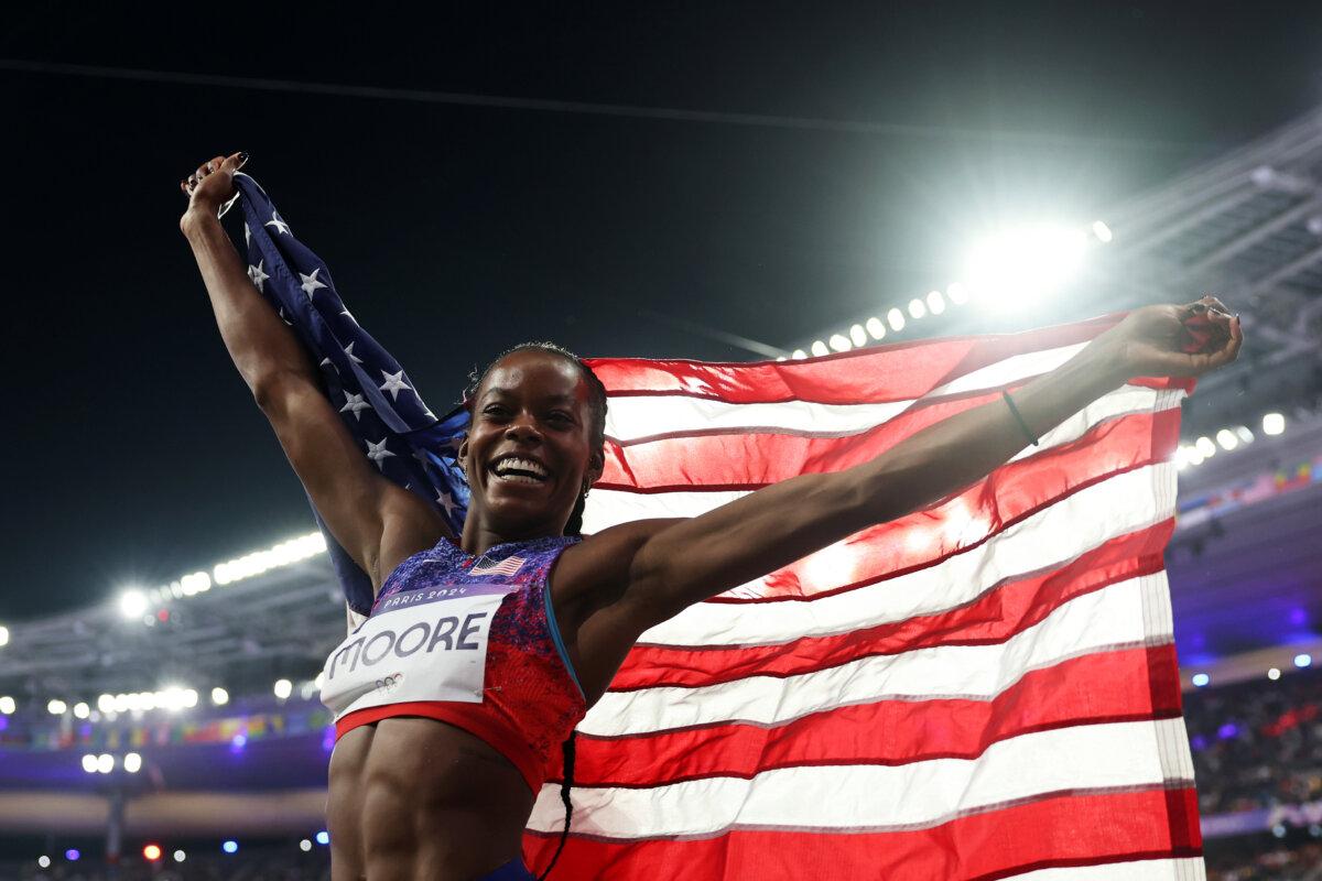 Bronze medalist Jasmine Moore of Team United States celebrates following the Women's Triple Jump Final on day eight of the Olympic Games Paris 2024 at Stade de France in Paris on August 3, 2024. (Cameron Spencer/Getty Images)
