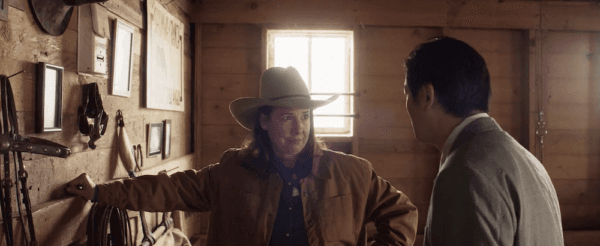 Peg (Robin Weigert) explains to Hideki (Arata Iura) how things actually work on an American ranch, in "Tokyo Cowboy." (Salaryman Films LLC)