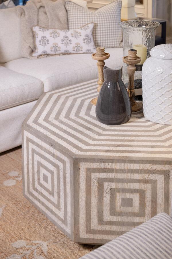 Pairing similar-toned wood and upholstery pieces creates cohesion and serenity within a space. (Handout/TNS)