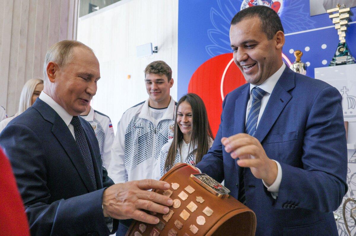 Russia's President Vladimir Putin (L) and International Boxing Association (IBA) president Umar Kremlev (R) at the Luzhniki Sports Complex, in Moscow, Russia, on Sept. 10, 2022. (Gavriil Grigorov/Sputnik/AFP via Getty Images)