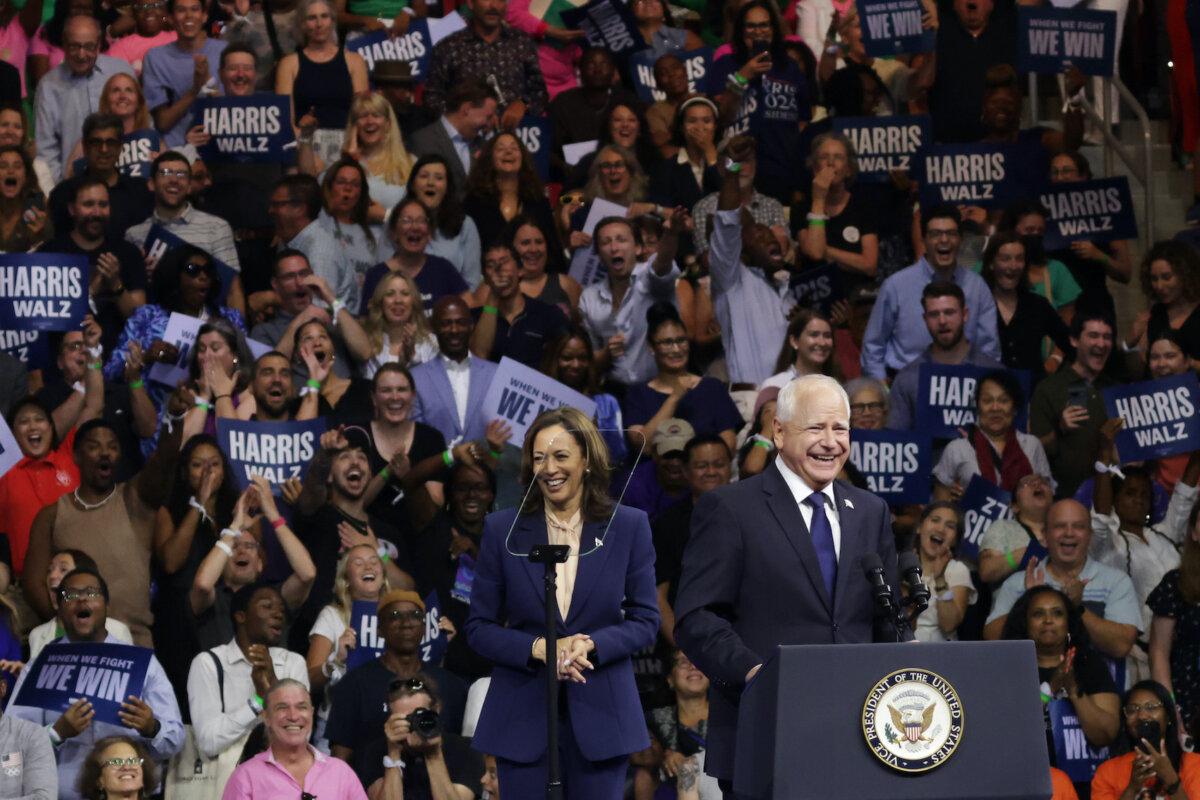 Democratic vice presidential candidate Minnesota Gov. Tim Walz (R) speaks as Democratic presidential candidate U.S. Vice President Kamala Harris (L) listens during a campaign rally at Girard College in Philadelphia, Pa, on Aug. 6, 2024. (Alex Wong/Getty Images)