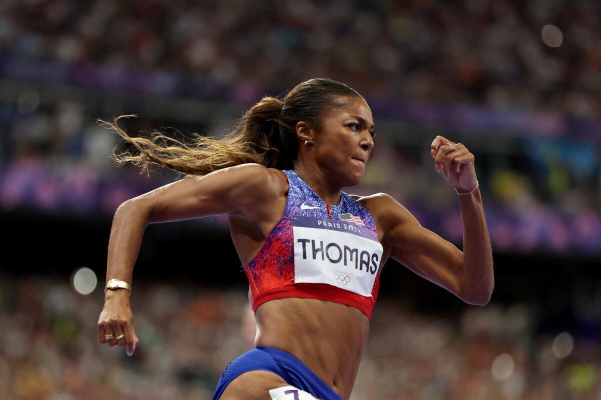 Gold medalist Gabby Thomas of Team United States competes during the women's 200m final on day eleven of the Olympic Games at Stade de France in Paris on Aug. 6, 2024. (Hannah Peters/Getty Images)