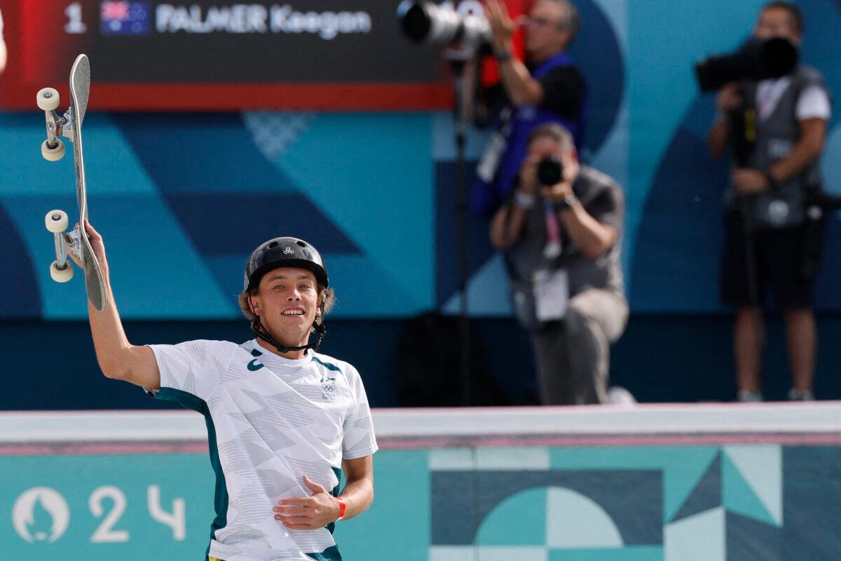 Australia's Keegan Palmer celebrates winning the gold medal at the end of the men's park skateboarding final during the Olympic Games at La Concorde in Paris on Aug。 7, 2024. (Odd Andersen/AFP via Getty Images)