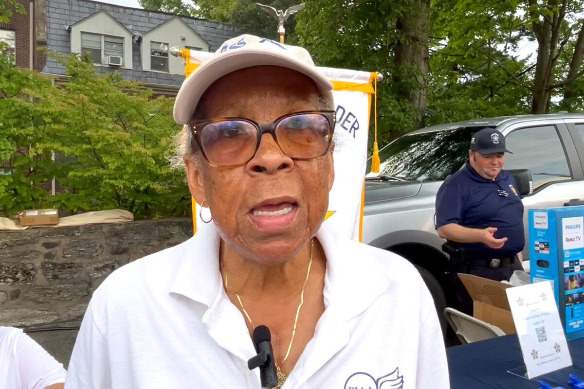 Christine Dixon Anderson, chairperson of the Police and Minority Relations Committee for Lower Merion Township, attends the annual National Night Out festival in Wynnewood, Pa., on the evening of Aug. 6, 2024. (Frank Liang/The Epoch Times)