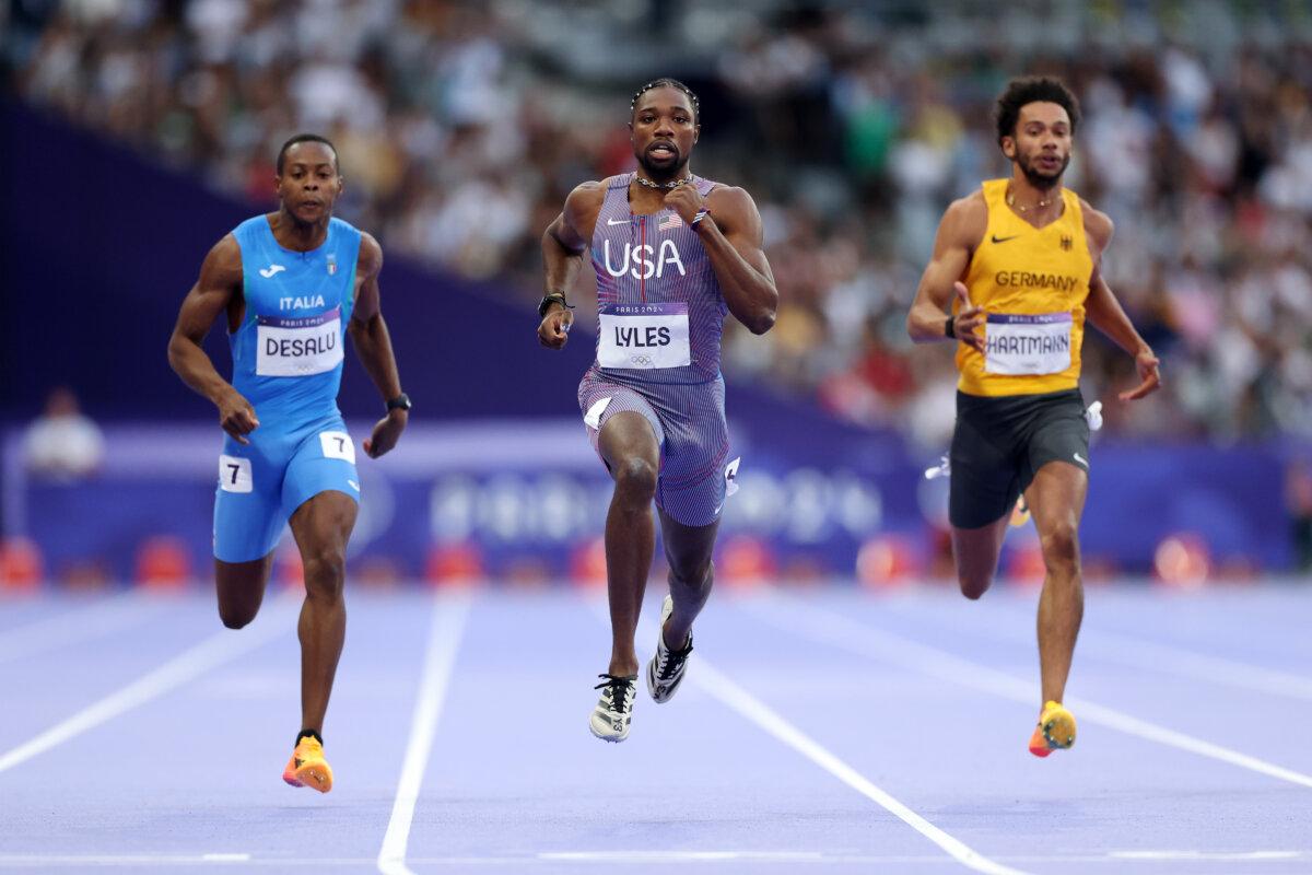 Noah Lyles (C) of Team United States competes in the Men's 200m Semi-Final on day twelve of the Olympic Games at Stade de France in Paris on Aug. 7, 2024. (Patrick Smith/Getty Images)