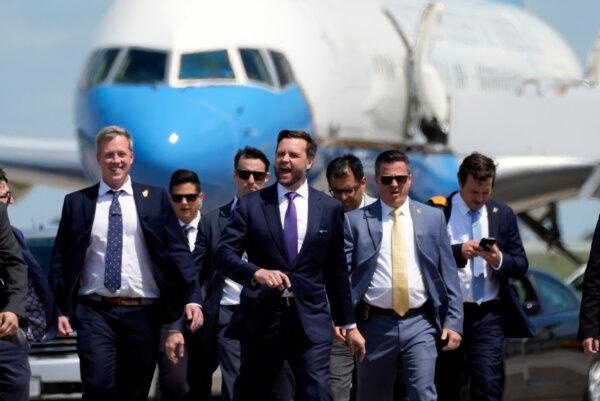 Republican vice presidential nominee Sen. JD Vance (R-Ohio) walks back from looking at Air Force Two at Chippewa Valley Regional Airport in Eau Claire, Wis., on Aug. 7, 2024. (AP Photo/Alex Brandon)