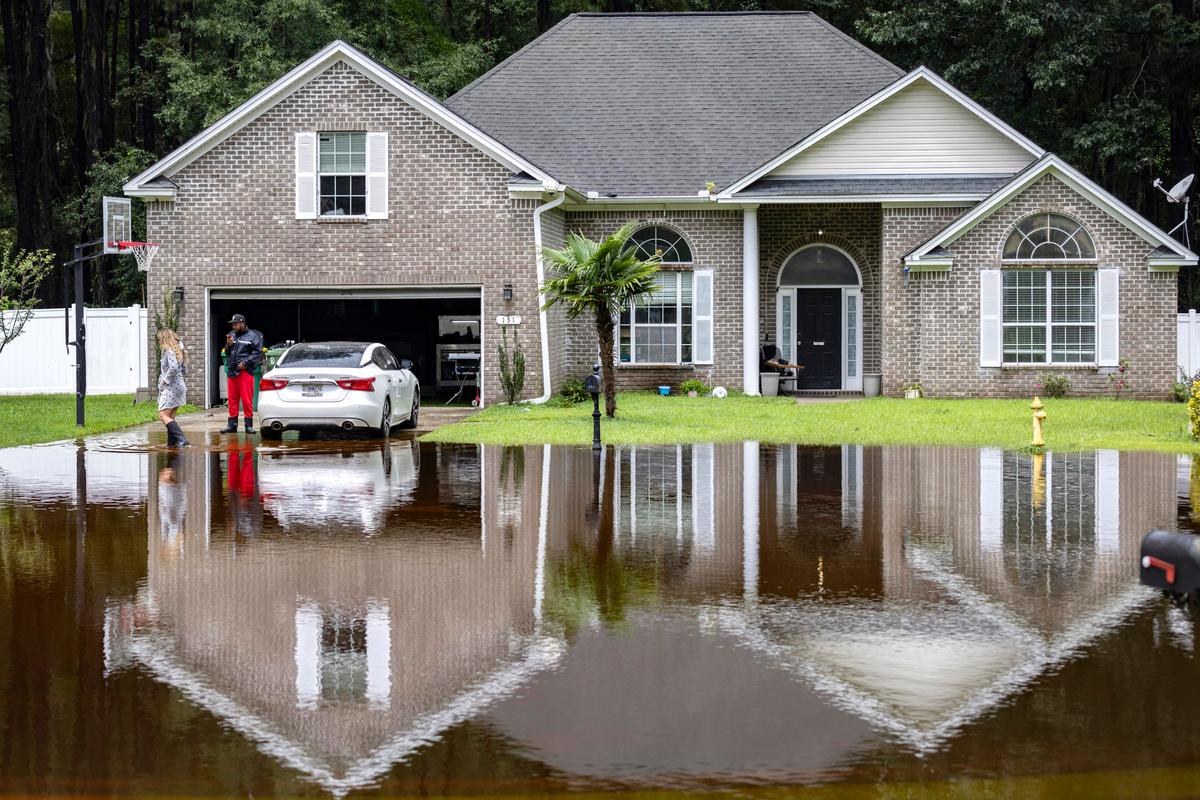 Tropical Storm Debby Doles out Repeat Deluges for Weather-Weary Residents