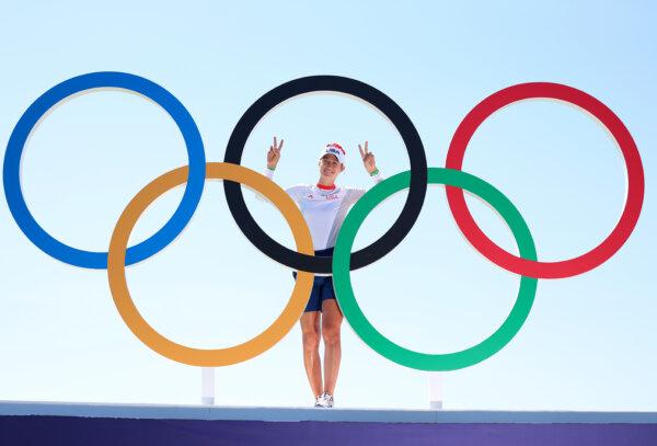 Nelly Korda of Team United States poses for a photo with the Olympic rings during a practice round ahead of the Women's individual play at the Olympic Games Paris 2024 at Le Golf National in Paris on Aug. 5, 2024. (Andrew Redington/Getty Images)