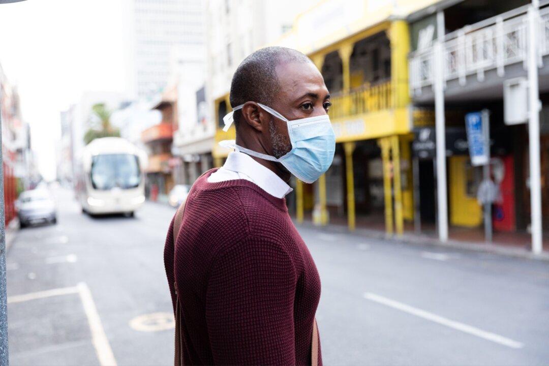 What Exactly Are You Inhaling When You Wear a Face Mask?