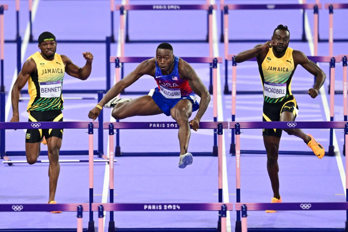 Grant Holloway of Team United States competes in the men's 110m hurdles final of the athletics event at the Paris 2024 Olympic Games at Stade de France in Saint-Denis, north of Paris, on Aug. 8, 2024. (Martin Bernetti/AFP via Getty Images)