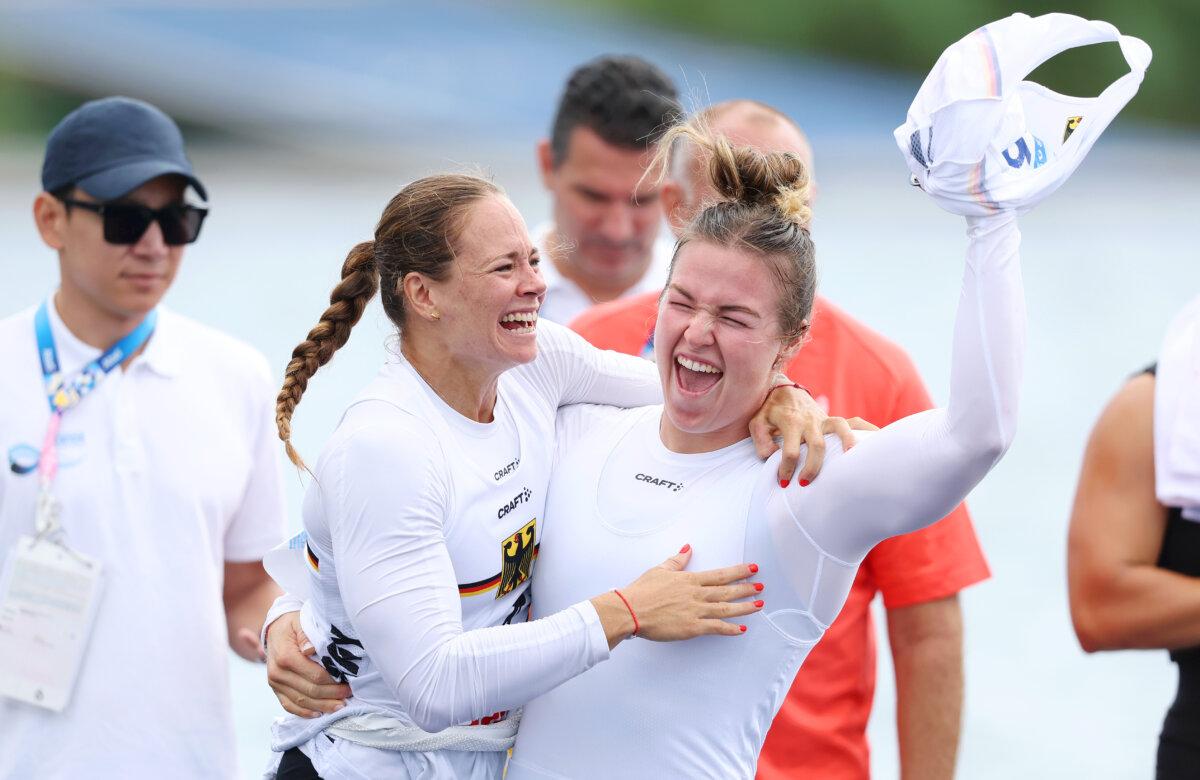Paulina Paszek and Jule Marie Hake of Team Germany celebrate winning bronze during the women's kayak double 500-meter final A on day 14 of the Olympic Games at Vaires-Sur-Marne Nautical Stadium in Paris on Aug. 9, 2024. (Justin Setterfield/Getty Images)