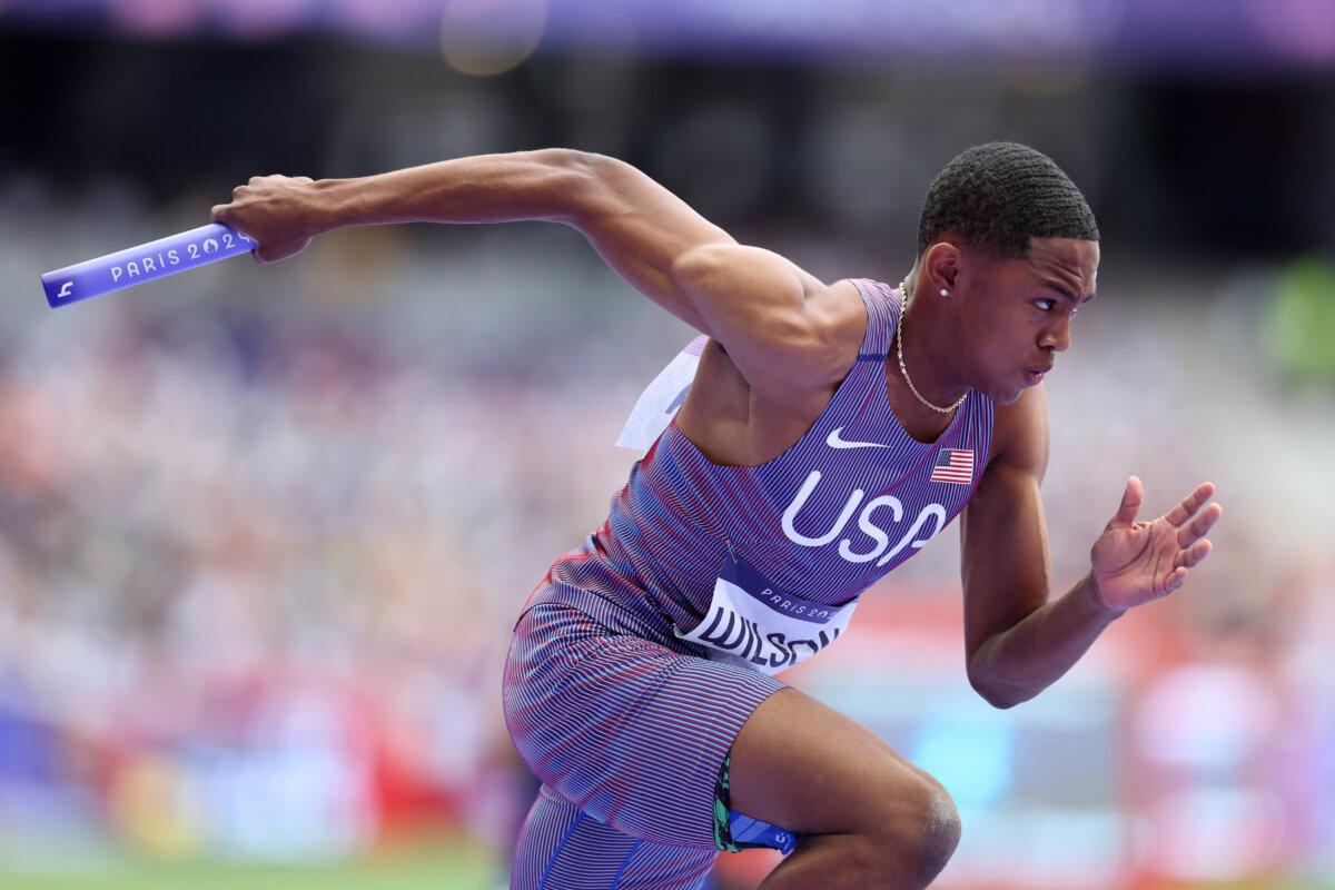 Quincy Wilson of Team United States competes in the men's 4 x 400-meter relay round 1 on day 14 of the Olympic Games at Stade de France in Paris on Aug. 9, 2024. (Christian Petersen/Getty Images)
