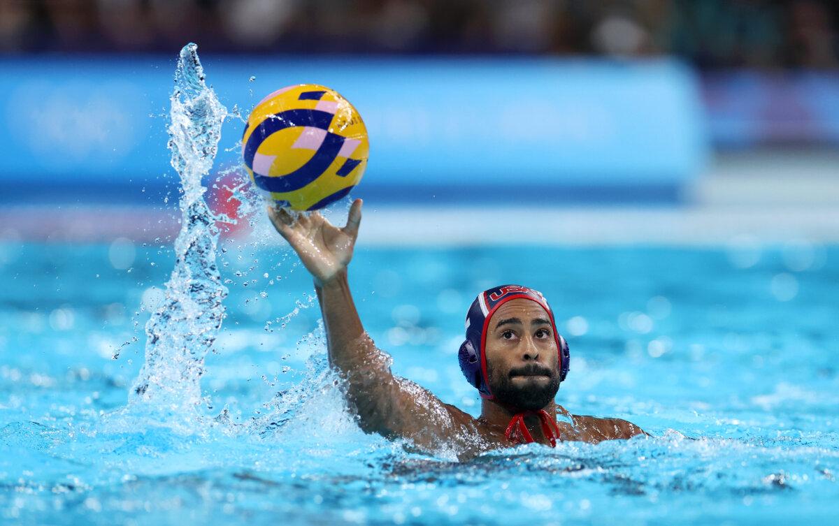 Max Irving of Team United States passes the ball in the men's semifinal match between Team Serbia and Team United States on day 14 of the Paris Olympic Games at Paris La Defense Arena in Nanterre, France, on Aug. 9, 2024. (Quinn Rooney/Getty Images)