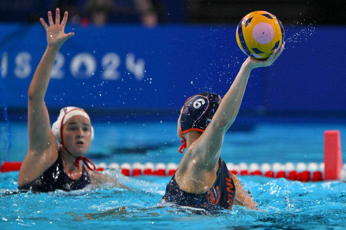 Netherlands' Simone Van De Kraats (6) attempts a shot in the women's water polo bronze medal match between USA and the Netherlands during the Olympic Games at the Paris La Defense Arena in Paris on Aug. 10, 2024. (Andreas Solaro/AFP via Getty Images)