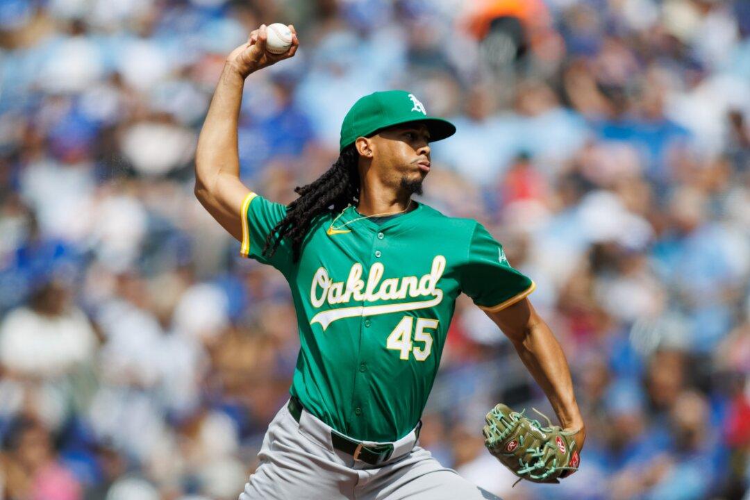 Rooker Hits 29th HR, Bido and 3 Relievers Combine on 2-hitter as Athletics Beat Blue Jays 1–0