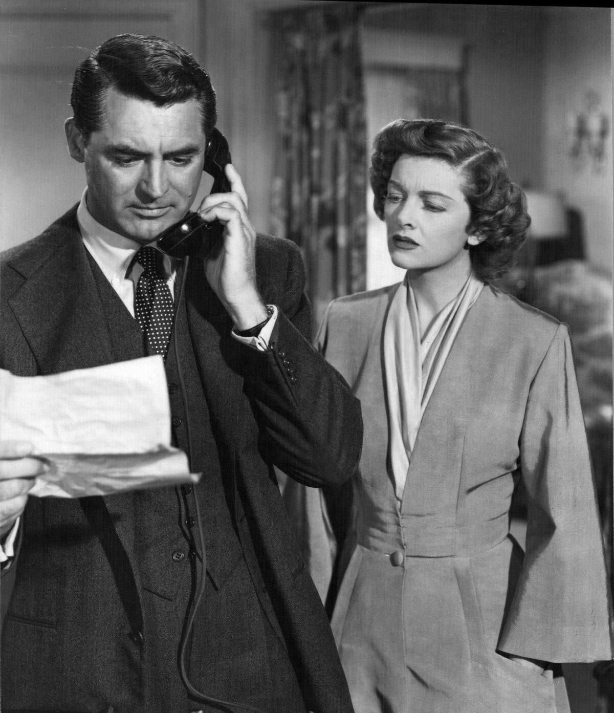 Jim Blandings (Cary Grant) and his wife Muriel (Myrna Loy) discuss their plans for their country home, in “Mr. Blandings Builds His Dream House.” (RKO Radio Pictures)