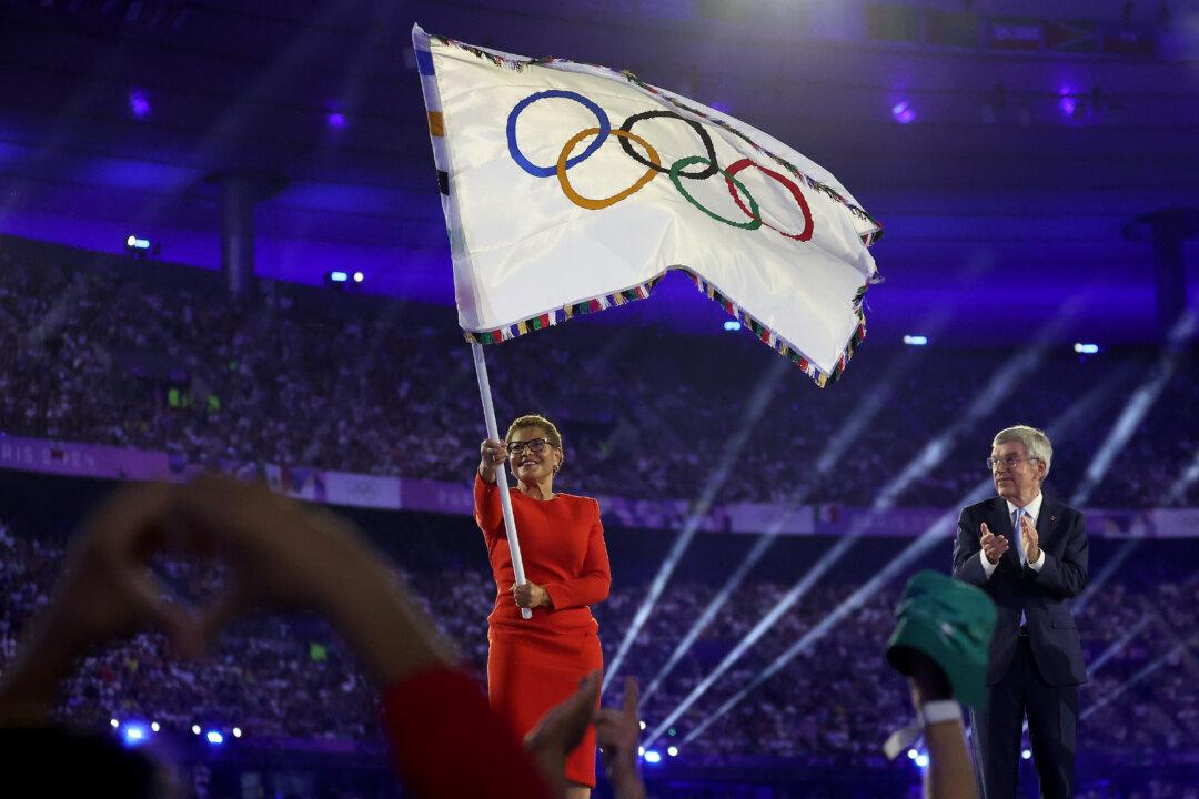 Mayor Bass Receives Olympic Flag From Paris as Los Angeles Takes the Baton