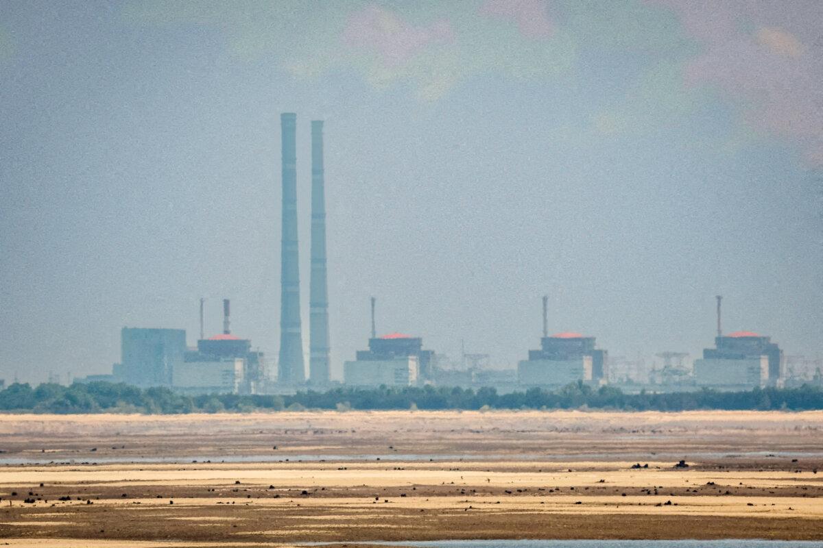 A view of the Zaporizhzhia Nuclear Power Station from the bank of Kakhovka Reservoir, near the town of Nikopol, Ukraine, on June 16, 2023. (Alina Smutko/Reuters)