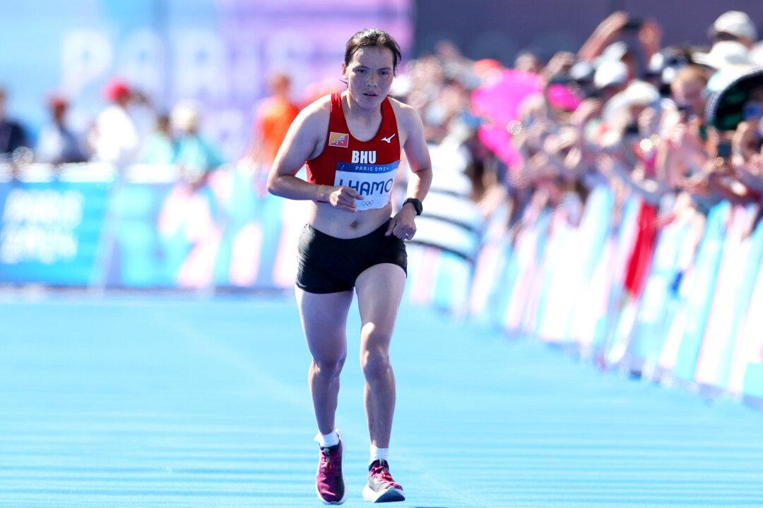 Bhutan’s Marathon Runner Gets Standing Ovation for Last-Place Finish