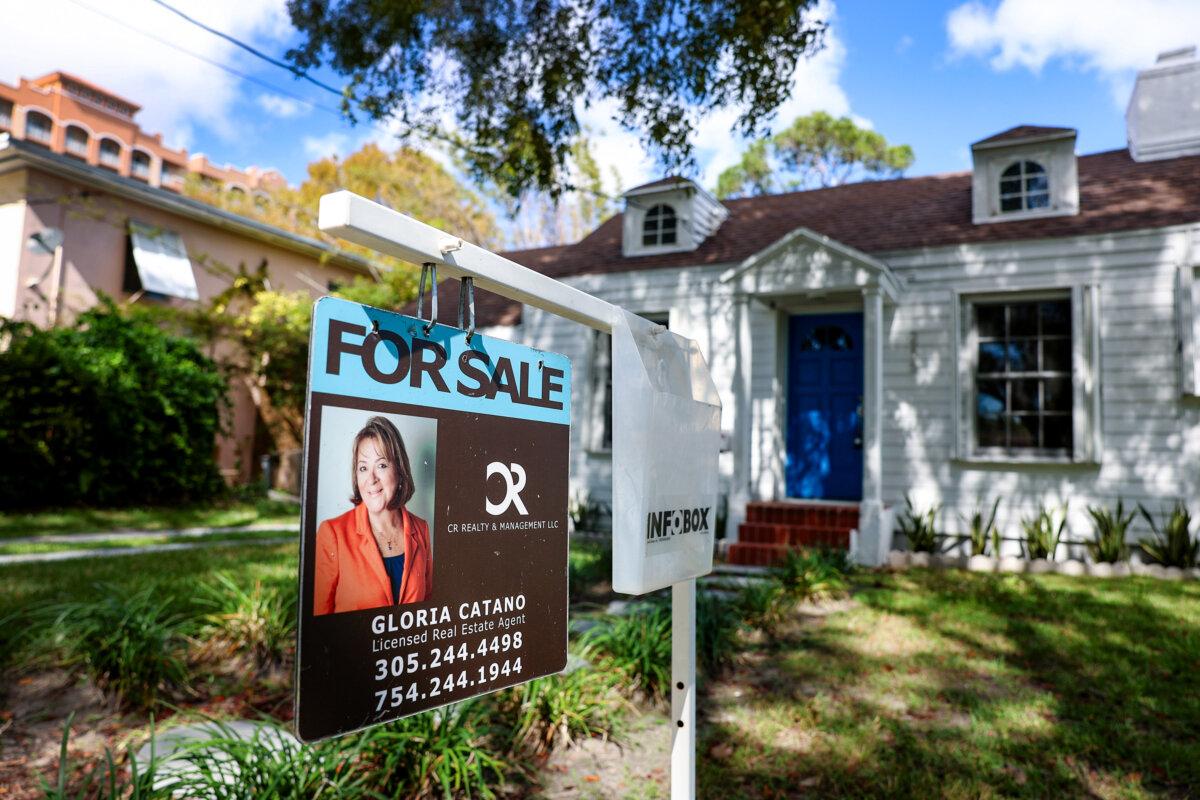 A For Sale sign is displayed at a Miami, Fla., home on Feb. 22, 2023. (Joe Raedle/Getty Images)