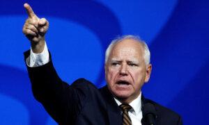 Walz Defends Military Record, Saying He’s Proud of His Service